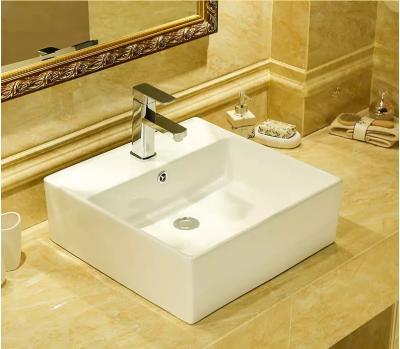 China 8079-1 YEXIZ Modern Most Popular Art Wash Basin Beautiful White Ceramic Countertop Bathroom Sink for sale