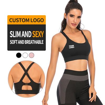 China Breathable Seamless Cross Woman Backless Cut Textured Shirt Tops Training Logo Yoga Top Custom Printing Workout Activewear for sale