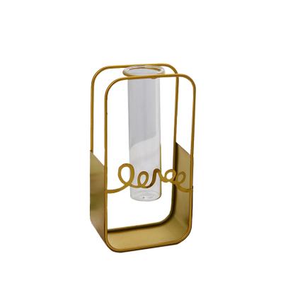 China Creative Contemporary Gold Nordic Style Crafts Ornaments Frame Desktop Hydroponic Metal Iron Glass Vase For Home Decoration for sale