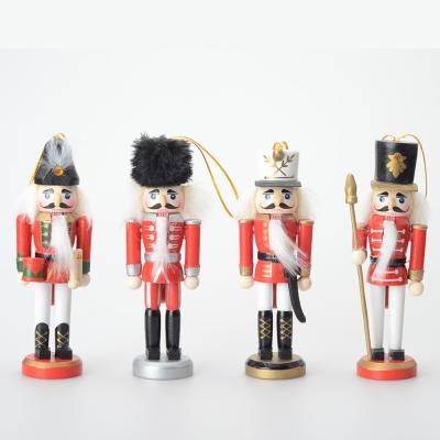 China Small Kids Style Christmas Wooden Nutcracker Toys Traditional Creative Home Office Decoration Ornaments Set of 4 for sale