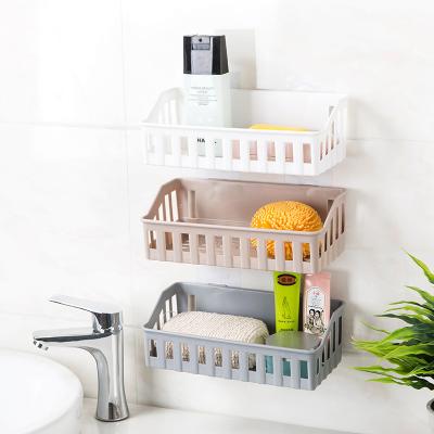 China 2021Amazon Hot Sale Durable Wall Hanging Bathroom Toiletry Rack Toiletry Rack Free Punching Plastic Shelf for sale