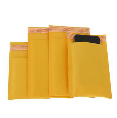 China Eco - Friendly Yellow Kraft Bubble Mailers Packaging Custom Paper Bubble Envelope Mailling Bag for sale