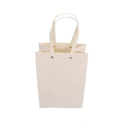 China Recyclable Custom Logo Shopper Manufacturers Kraft Paper Bag Assorted Size Personalized Logo Paper for sale