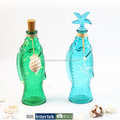 China Europe hot sale blue glass bottle with sea style, fish shaped glass bottle with led lighting for sale