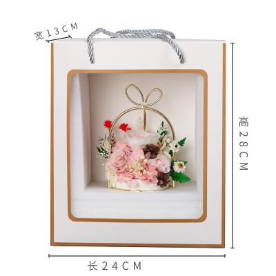 China Decoration Light Luxury Flowers Portable Wrought Iron Hanging Gift Box Gold Frame Floral Flower Stand Preserved Flower for sale