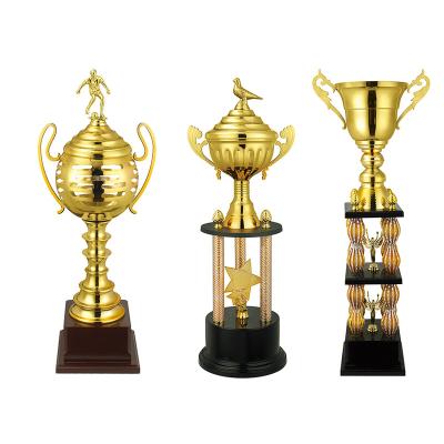 China Custom Wholesale Sublimation Latest Metal Award Trophy Golf Trophy Cup From Europe Trophies Manufacturer for sale