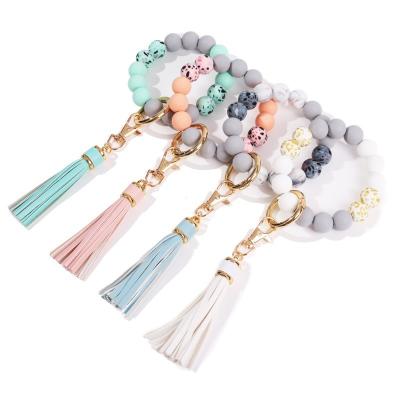 China New Custom Amazon Silicone Bead Agriculture Bead Bracelet Wooden Bead Wrist Tassels Chain Key Chain Accessories for sale