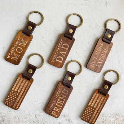 China Eco-Friendly Promotional Wooden Fashion Keychain Leather Logo Leather Key Chain Customized Key Chain For Souvenir Gift for sale