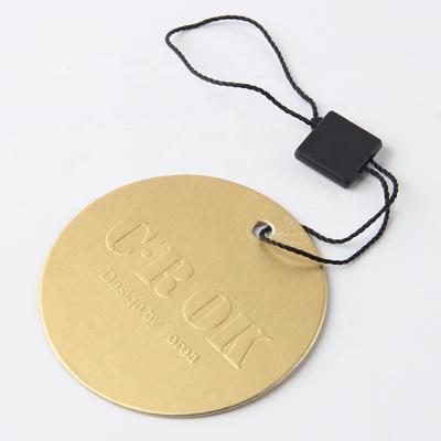 China Sustainable Wholesale Custom Design Type Round Embossing Paper Hang Tag for sale