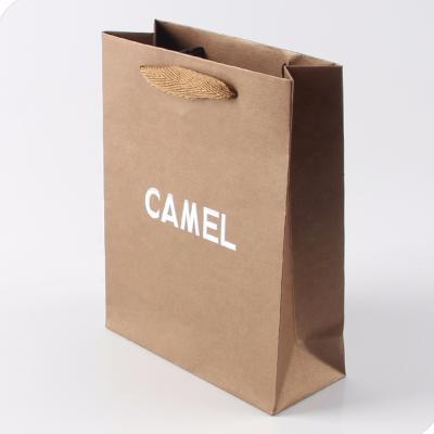 China Recyclable Embossing Silver Hot Stamping Logo Brown Kraft Paper Bag With Handles for sale