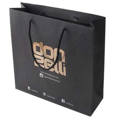 China New Design Recyclable Logo Printing Shopping Paper Bag Custom Made for sale