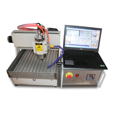 China Metal and non-metal material cnc smart router/mini 3040 cnc router 6040 desktop cnc engraving machine for sale