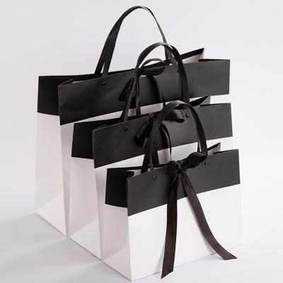 China Eco Friendly Reusable Handle Shopping Bag Paper Custom Your Design Private White Art Luxury Gift Packaging Bag With Ribbon Handles for sale