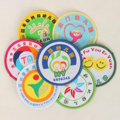 China New Custom Made High Density School Uniform Woven Badge Design Garment Patch Nickel Free Sew On Polyester Fabric Garment Patch for sale