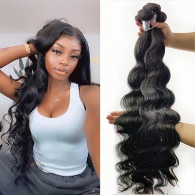 China Cheap Brazilian Body Wave Hair Bundles 28 Inch Wavy Weave Peruvian Hair Bundles Body Wave Hair Bundles For Women for sale