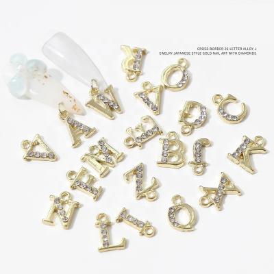 China The English Nail Art Ornaments Gold Pendant Dangle Alloy Letter Art Decoration Paso Sico 26 Nail Charm With Diamond Shining 3D Design for sale