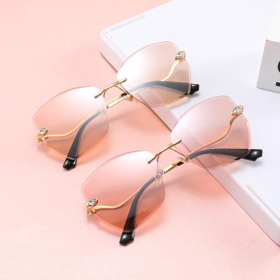 China Sunglasses 25059 Diamond Cut Women Rimless Sunglasses fashion shape 2022 coating sunglasses wholesale for sale