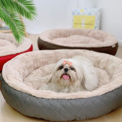 China Round Pet Bed Cat Donut Bed Faux Fur Travel Dog Bed Self-heating Comfortable Plush Cat House for sale