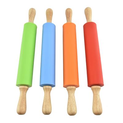 China Viable IN STOCK High quality silicone pin with non-stick surface with wooden handle for sale