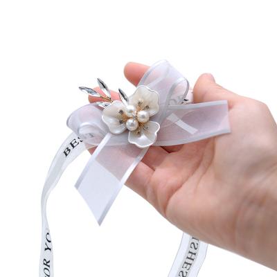 China Bridal Wedding Decor Wedding Groom Boutonniere Bride Bridesmaid Wrist Flower Simulation Silk Flower for sale