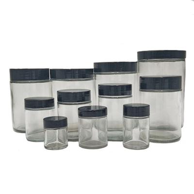 China Stocked Many Sizes Glass Honey Jam Food Tea Storage Right Side Jars With Black Lid for sale