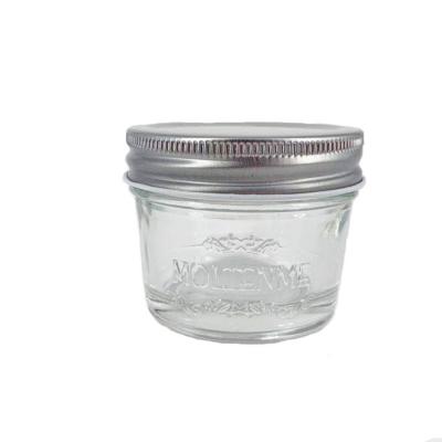 China Wholesale Custom Stocked 125ml 4oz Embossed Logo Engraved Glass Mason Jar For Cake Topper With Lid for sale