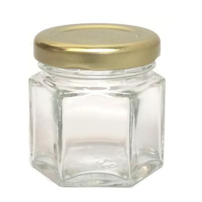 China Empty Hexagon 45ml Small Mini Hexagonal Glass Jar For Honey Nut Sauce Peanut Butter for sale