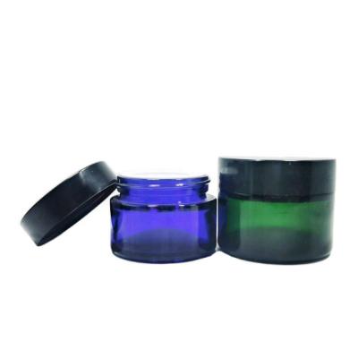 China Green color cosmetic glass jar bule facial cream glass jar 20g30g50g container with lid for sale