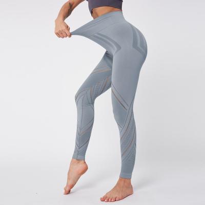 China Wholesale New Cavity High Waist Women Sports Fitness Gaiters Workout Apparel Anti-Static Yoga Tight Pants for sale