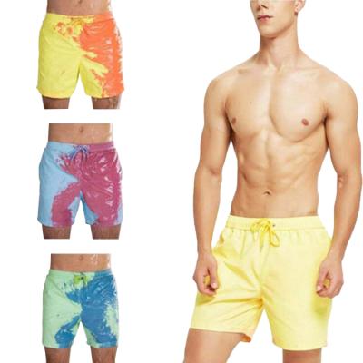 China Anti-wrinkle beach shorts men change color swimming pants summer sports running casual shorts for sale