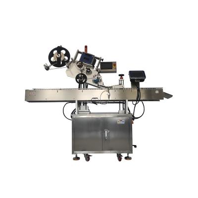 China Flat surface horizontal automatic sticker food sticker labeling machine for small round bottle for sale