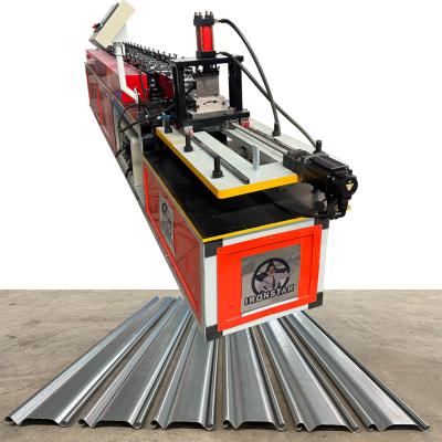 China 30-50m/min fast speed cutting rolling shutter door roll forming machine in Brazil Raw material: Galvanized steel for sale