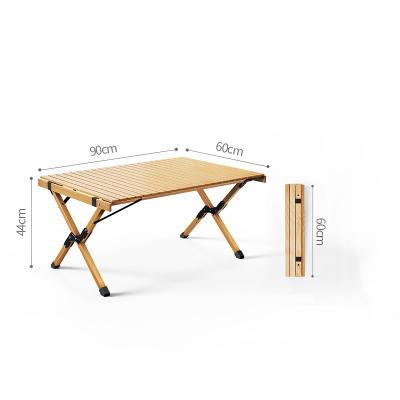 China 2022New Compact Outdoor Camping Picnic Egg Roll Wooden Portable Folding Table for sale