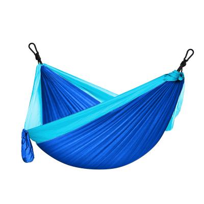 China Modern Outdoor Portable Canvas Camping Swing Hammock Folding Rainbow Stripe Water Hammock for sale