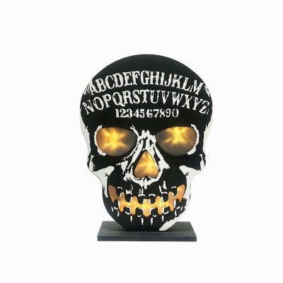 China Luxury Day Of The Dead Party Decoration Decoration Wooden Halloween Skull With Battery Power LED Light for sale