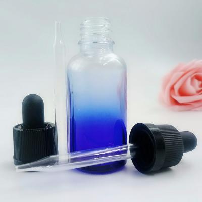 China E liquid 30ml faded blue gradient glass dropper bottles with child safe and tamper evident caps for sale