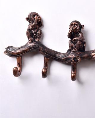 China Luxury Morden Monkey Resin Clothing Rack Coat Wall Hanger Hook For Living Room Decoration for sale