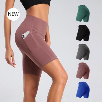 China Outdoor Activity Breathable Womens Stretch Underwear Tops Sport Shorts With Pockets Yoga Shorts for sale