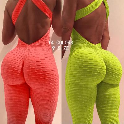 China XXXL Size Ladies Fitness Jumpsuit Halter Yoga Exercise Breathable Fitness Pants Inner Jacquard Skinny Overalls Plus Size for sale