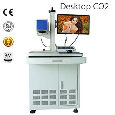 China Laser CO2 Laser Marking Machine For Bottle / Wood / Plastic Cloth With CE for sale