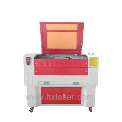 China Garment Shops 6040 Laser Engraving Machine Laser Cutter Machine With Rotary Device for sale