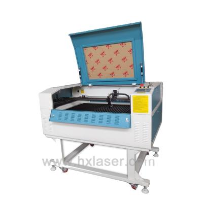 China Garment Shops Mini Laser Cutting Machine Laser Cutter Machine With Rotary Device for sale