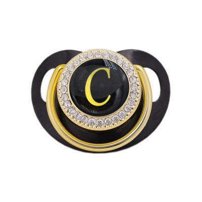 China Unique 26 Bling Baby Name Initial Baby Shower Gift BPA Pacifier Alphabet Pacifier Free Gold Black Letter Pacifier for sale