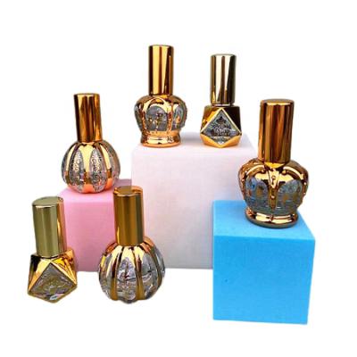 China Fashionable 8ml 12ml 15ml Perfume Glass Bottle Empty Crown Pumpkin Shape Perfume Atomizer Refillable Spray Bottle Travel Packaging for sale