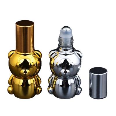 China 8ml Cosmetic Empty Roll On Perfume Bottle Gold Silver Aroma Deodorant Roller Glass UV Bear Shaped Essential Oil Roll On Bottle for sale