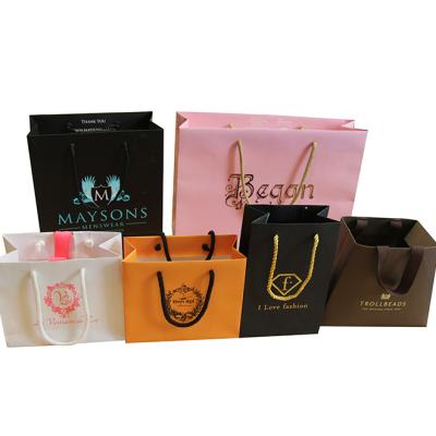 China ANTISTATIC Custom Luxury Matte Black Shopping Paper Bag With Logo For Apparel Packaging for sale