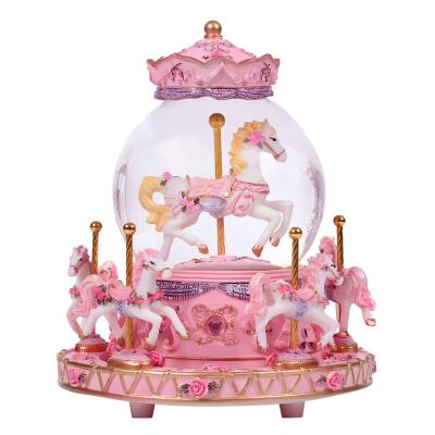 China 2019 Polyresin LED Light Snowflake Crystal Ball Shape Carousel Music Box for sale