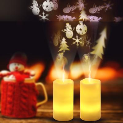 China Christmas Snowflakes Christmas Candle Light Rotating LED Projection Candle Night Light Atmosphere Creative Christmas Gift With Remote Control for sale