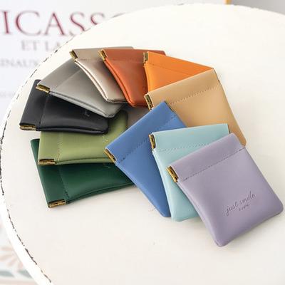 China Small coin change purse money earphone bag holder coin purse eco-friendly leather purse cool exquisite/mini art squeeze for sale