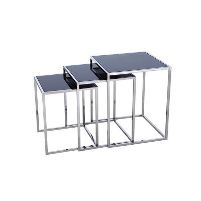 China Contemporary Modern Square Black Glass Mirrored Metal Frame Nesting Top Silver Coffee Table Set Of 3 for sale